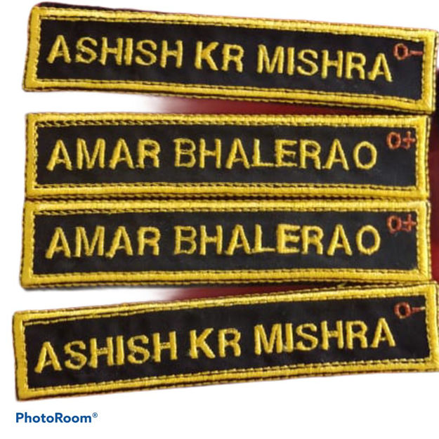 Picture of Black Background And Yellow Font Nameplate