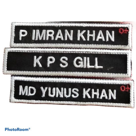 Picture of Black Background And White Font Nameplate